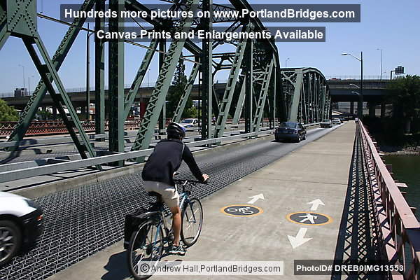 Cyclist Riding on Hawthorne Bridge (Portland, Oregon)